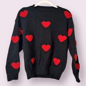 Black Sweater with Red Heart Accents